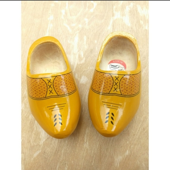 yellow wooden clogs
